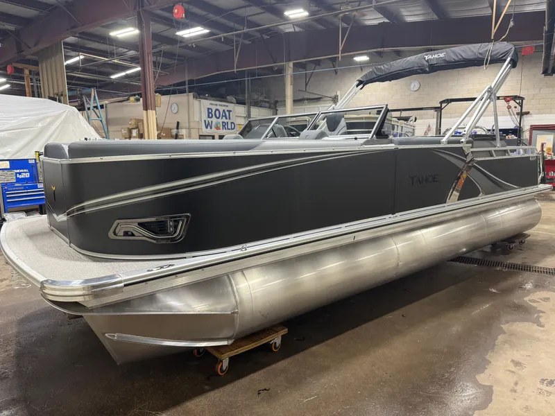 Slide: The Image of 2026 Tahoe LTZ 2385 Elite Tritoon displayed indoors. - 36