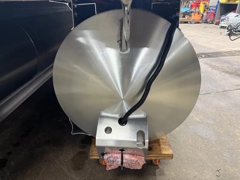 Slide: The Image of Close-up of a 2026 Tahoe LTZ 2385 Elite Tritoon. - 42