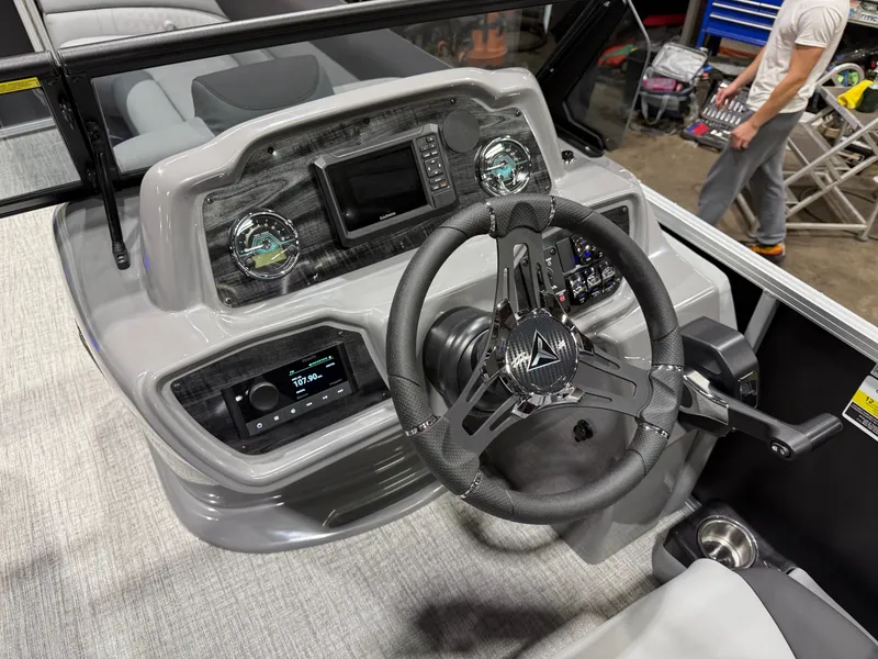 Slide: The Image of Interior view of 2026 Tahoe LTZ 2385 Elite Windshield 300HP Tritoon. - 15