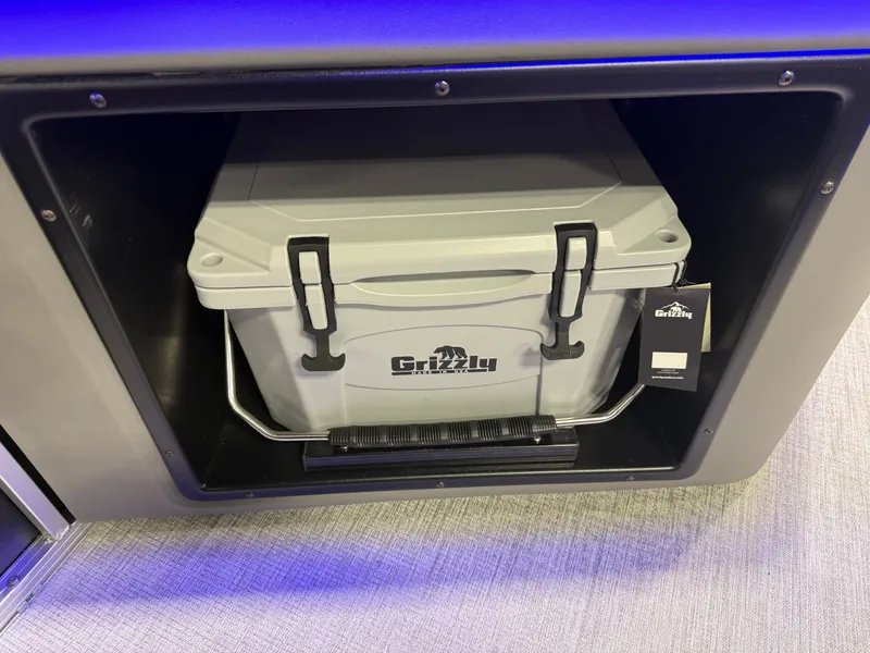 Slide: The Image of Grizzly cooler in Tahoe LTZ 2385 Elite Tritoon, 2026 model. - 22