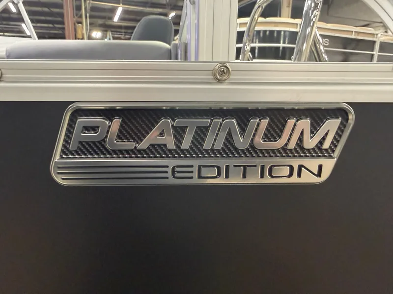 Slide: The Image of Platinum Edition emblem on Tahoe LTZ 2385 Elite 2026 Tritoon. - 40