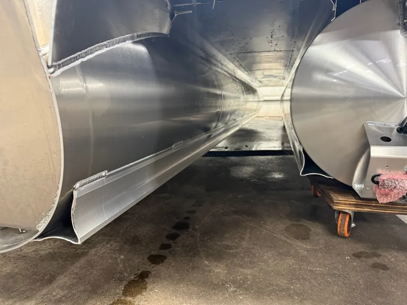 Slide: The Image of Underside of a 2026 Tahoe LTZ 2385 Elite Tritoon. - 46