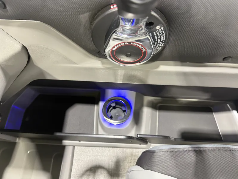 Slide: The Image of Interior of 2026 Tahoe LTZ 2385 VRB 300HP Swingback with illuminated cup holder. - 16