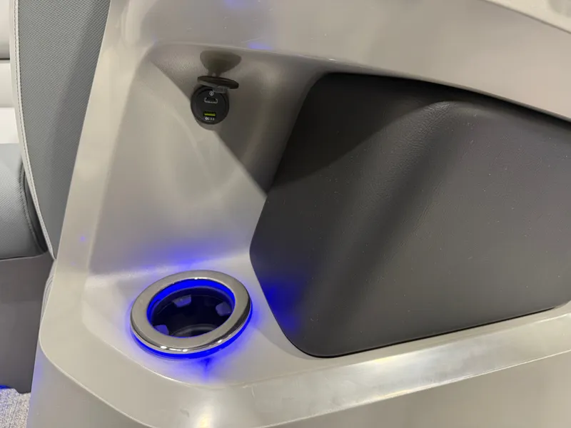 Slide: The Image of 2026 Tahoe LTZ 2385 VRB boat interior with illuminated cup holder. - 30