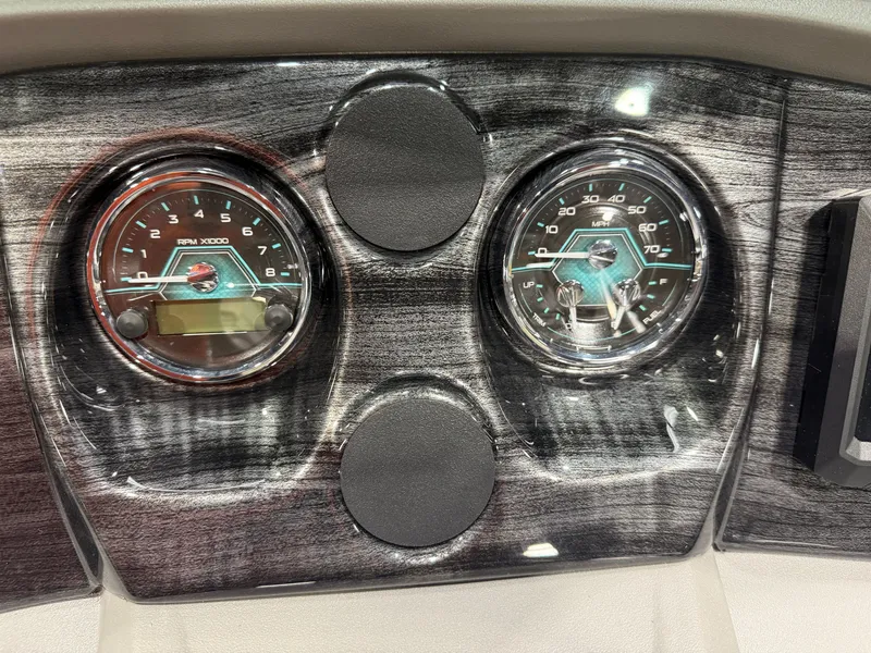 Slide: The Image of Dashboard of 2026 Tahoe LTZ 2385 QLS with speedometer and tachometer. - 16