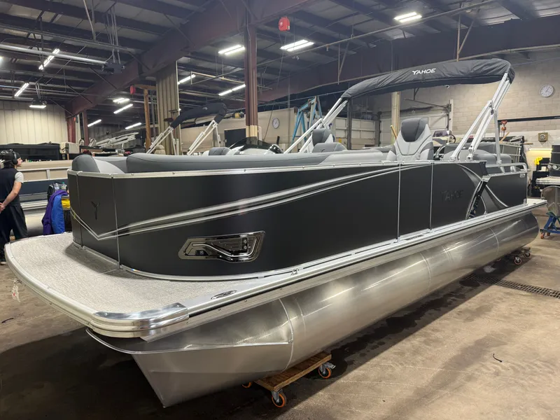 Slide: The Image of 2026 Tahoe LTZ 2385 QLS pontoon boat in a workshop. - 36