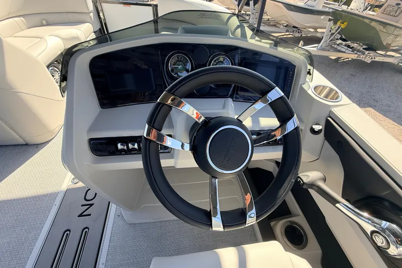 Slide: The Image of Steering console of 2026 Avalon 2385 LSZ Versatile Rear Bench, Tri Toon boat. - 25