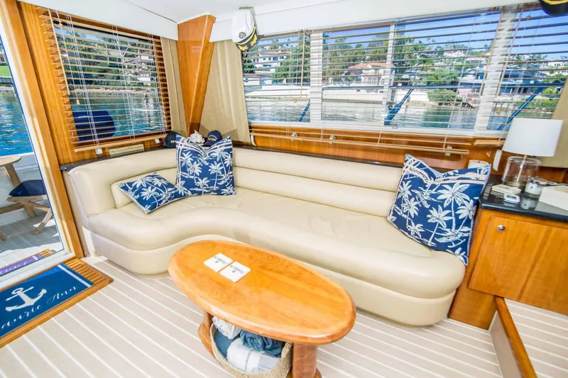 Slide: The Image of Luxurious interior of 2005 Navigator 4400 Pilothouse yacht with plush seating and nautical decor. - 4