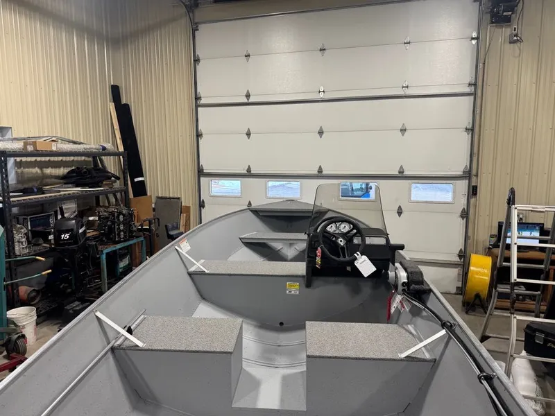 Slide: The Image of 2026 Lund SSV-18 boat in a workshop. - 4