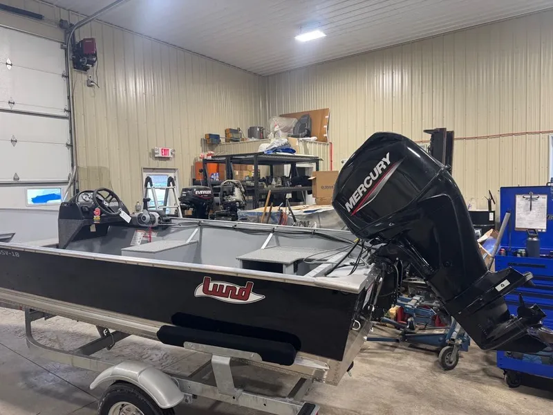 Slide: The Image of 2026 Lund SSV-18 boat with Mercury engine in workshop. - 8