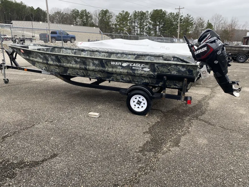 The Image of 2011 War Eagle 648LDV boat with trailer and outboard motor. - 1
