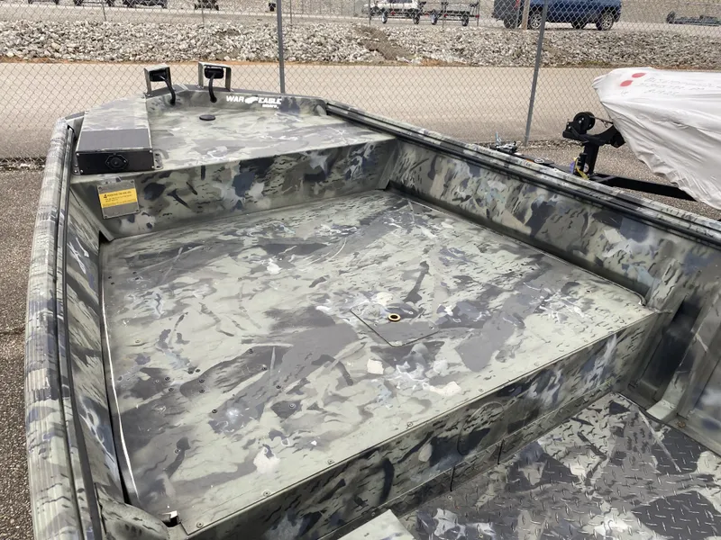 Slide: The Image of War Eagle 648LDV 2011 boat with camouflage pattern and open deck. - 10