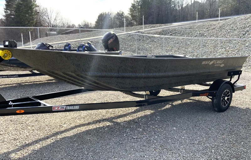 The Image of War Eagle 860LDV 2026 on trailer, parked outdoors. - 1