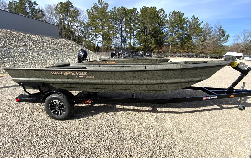 Slide: The Image of War Eagle 860LDV boat on trailer, 2026 model. - 7