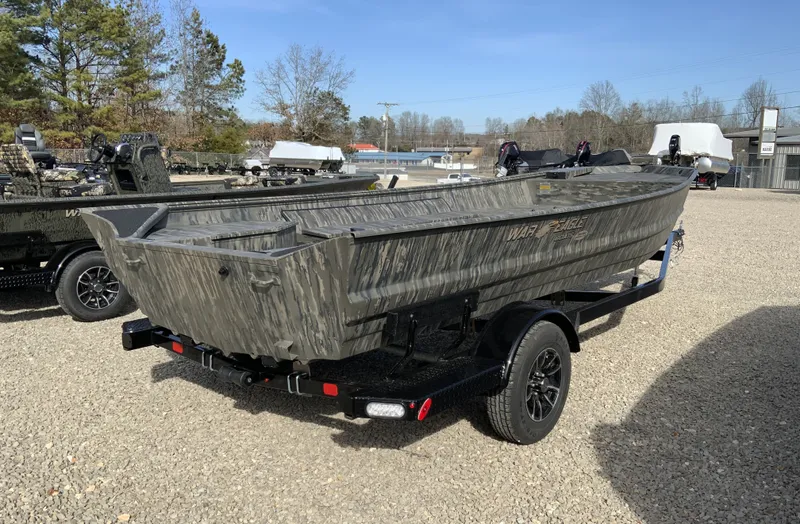 Slide: The Image of 2026 War Eagle 860LDV boat on trailer outdoors. - 3
