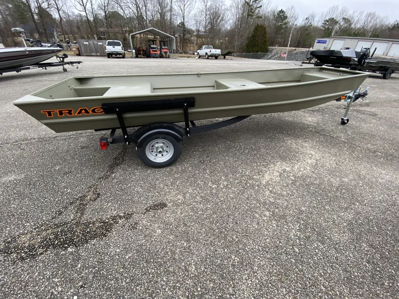 Slide: The Image of 2026 Tracker Grizzly 15 Jon boat on trailer outdoors. - 5