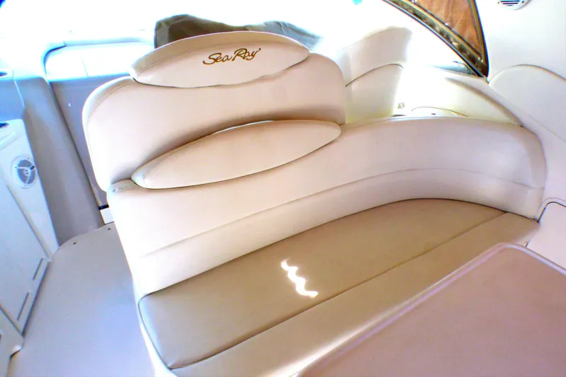 Slide: The Image of Luxurious seating on a 2002 Sea Ray 340 Sundancer boat interior. - 26