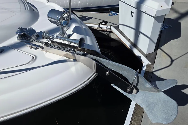 Slide: The Image of Bow of 2002 Sea Ray 340 Sundancer with anchor and chain at dock. - 30