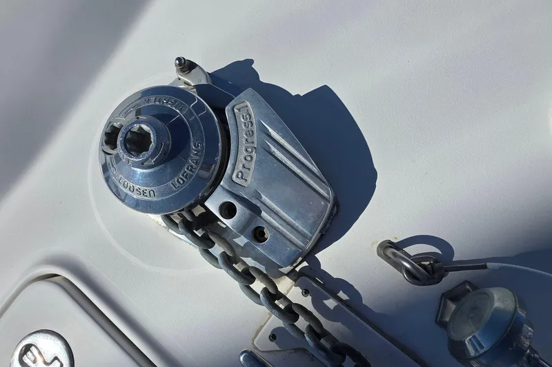 Slide: The Image of Anchor windlass on 2002 Sea Ray 340 Sundancer boat deck. - 31