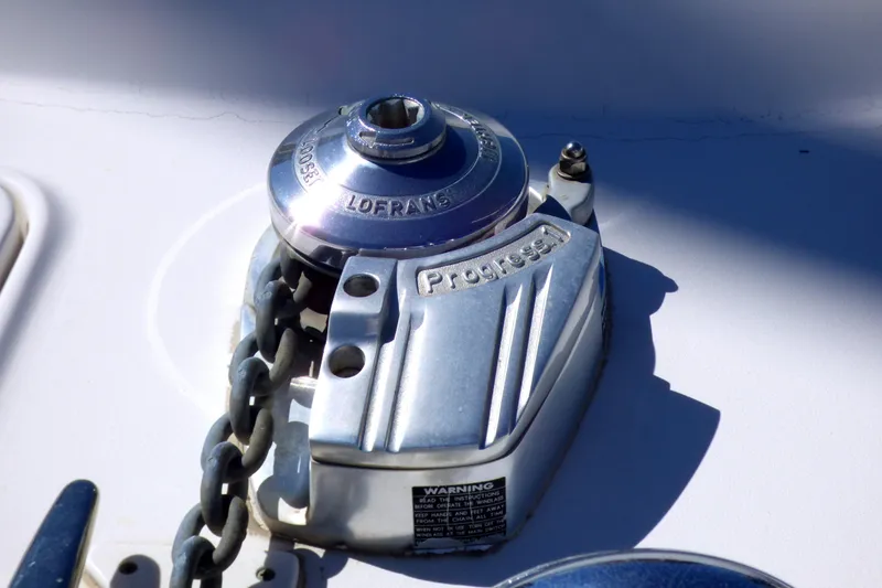 Slide: The Image of Anchor windlass on 2002 Sea Ray 340 Sundancer boat deck. - 32