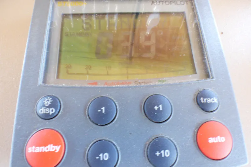 Slide: The Image of Autopilot control panel on 2002 Sea Ray 340 Sundancer boat, displaying standby mode. - 42