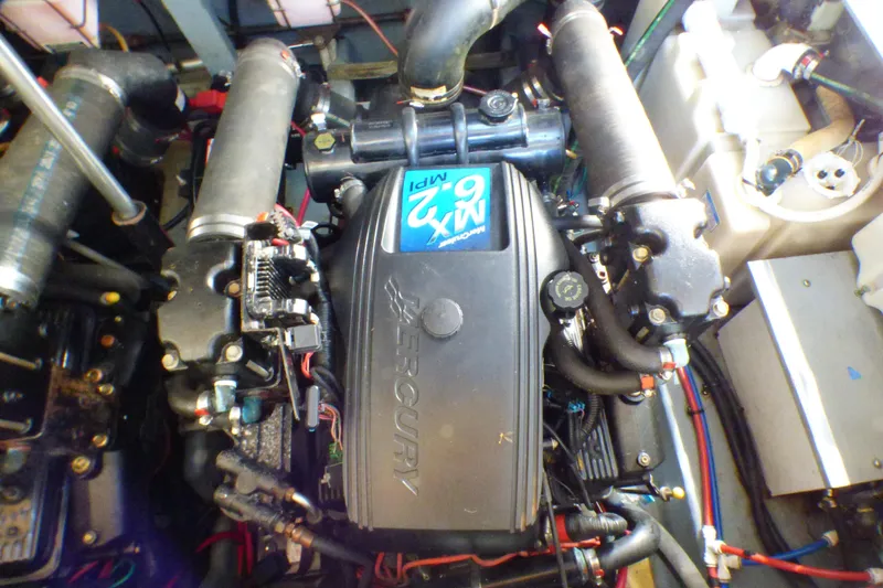 Slide: The Image of Engine of 2002 Sea Ray 340 Sundancer boat, featuring Mercury 6.2L MPI. - 47