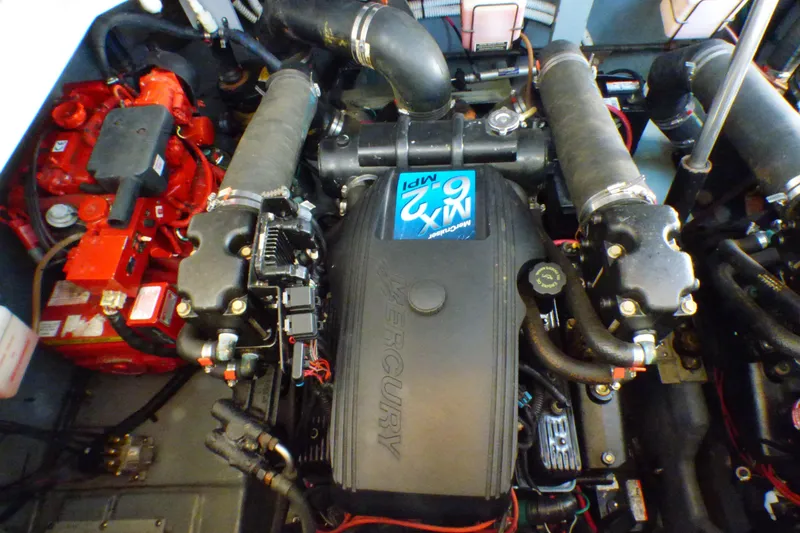 Slide: The Image of Engine compartment of a 2002 Sea Ray 340 Sundancer with Mercury MX 6.2 MPI engine. - 48