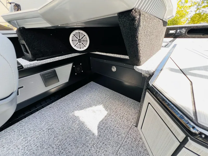 Slide: The Image of Interior of 2026 Starcraft Delta 178 DC with speaker and storage. - 11