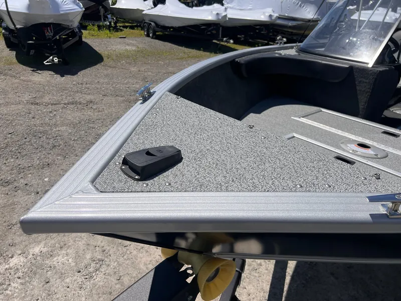 Slide: The Image of Starweld Fusion Pro 18 DC 2026 boat, front deck view outdoors. - 14