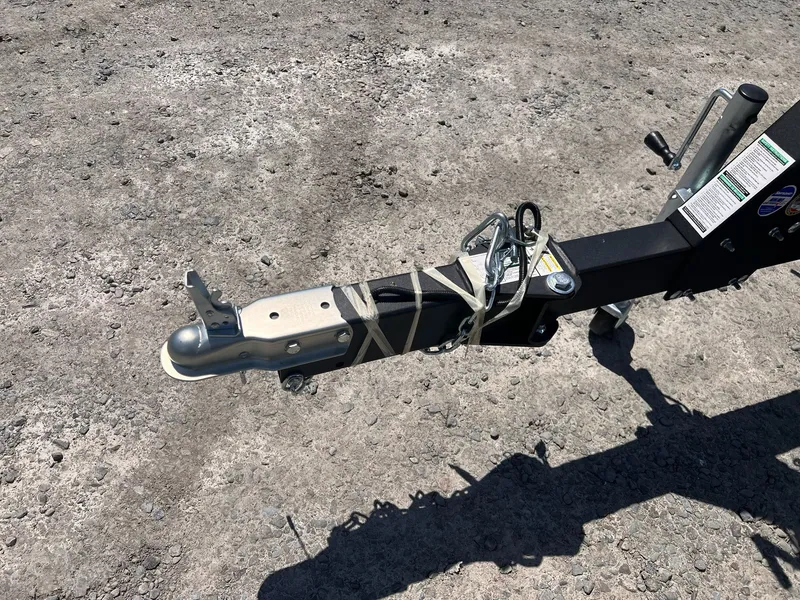 Slide: The Image of Starweld Fusion Pro 18 DC trailer hitch, 2026 model on gravel surface. - 15