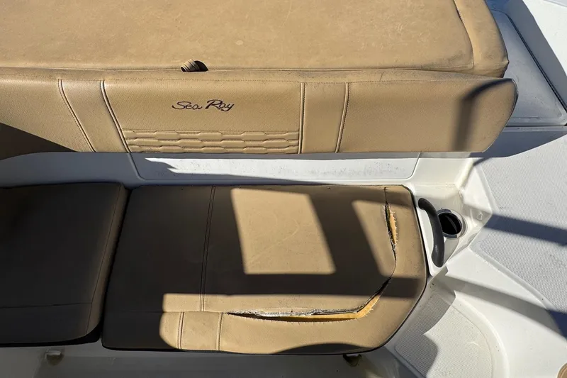 Slide: The Image of 2022 Sea Ray SPX 190 Outboard boat seat with visible wear and tear. - 22