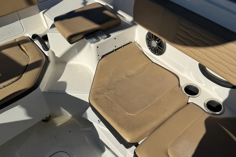 Slide: The Image of Interior seating of 2022 Sea Ray SPX 190 Outboard boat with tan upholstery. - 32