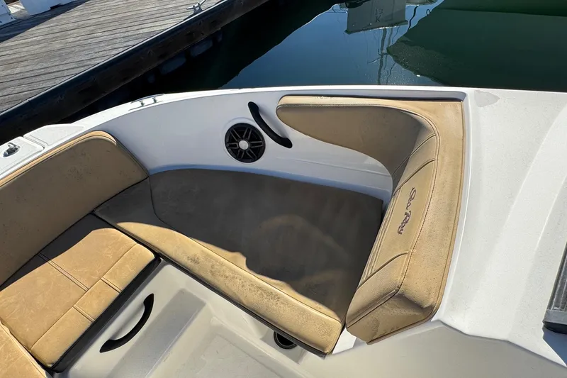 Slide: The Image of 2022 Sea Ray SPX 190 Outboard boat interior with tan seating and speaker. - 37