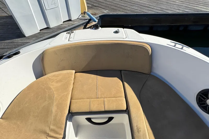 Slide: The Image of 2022 Sea Ray SPX 190 Outboard boat with tan seating, docked at a wooden pier. - 38