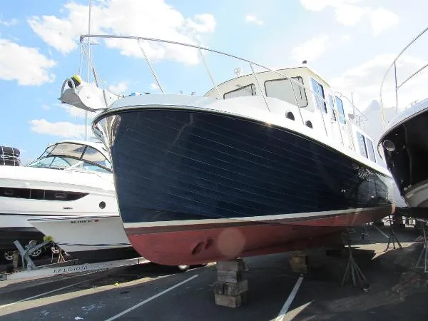Slide: The Image of American Tug 34 Pilothouse Trawler 2002 - 2
