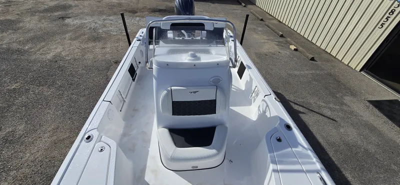 Slide: The Image of Interior view of 2026 Tidewater 2110BMT boat on a parking lot. - 17