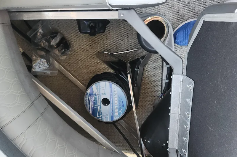 Slide: The Image of Interior of 2022 Tahoe Tritune 2585 ENT with anchor line and accessories. - 34