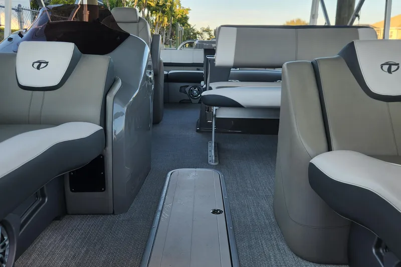 Slide: The Image of Interior of 2022 Tahoe Tritune 2585 ENT pontoon boat with luxurious seating. - 38