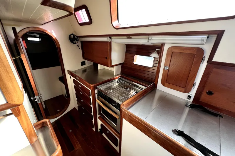 Slide: The Image of Luxurious interior of 2014 Custom Aluminum Expedition yacht with blue seating and wooden accents. - 10