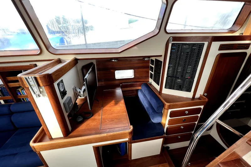 Slide: The Image of Interior of 2014 Custom Aluminum Expedition yacht with wood and blue upholstery. - 11