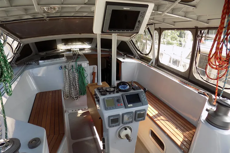 Slide: The Image of 2014 Custom Aluminum Expedition yacht interior with wood cabinetry and stainless steel kitchen. - 16