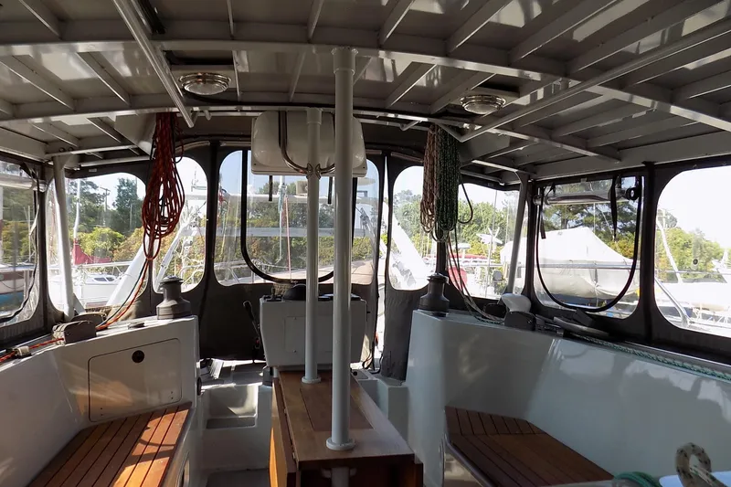 Slide: The Image of Interior of 2014 Custom Aluminum Expedition yacht with wooden cabinetry and compact bathroom. - 21