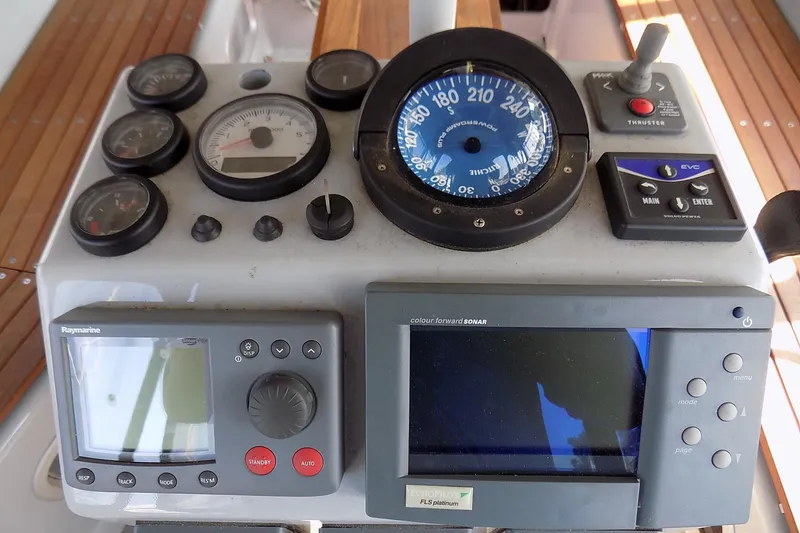 Slide: The Image of Control panel of 2014 Custom Aluminum Expedition boat with navigation instruments and sonar display. - 24