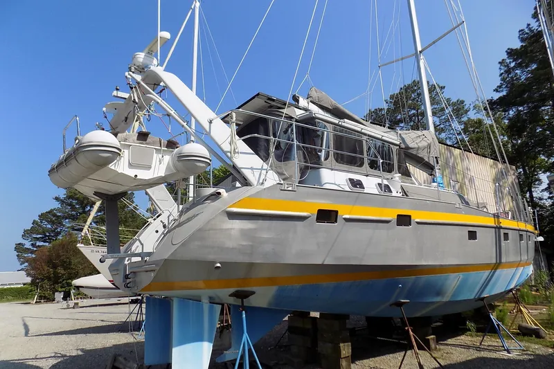 Slide: The Image of Custom 2014 Aluminum Expedition sailboat on dry dock, blue sky background. - 3