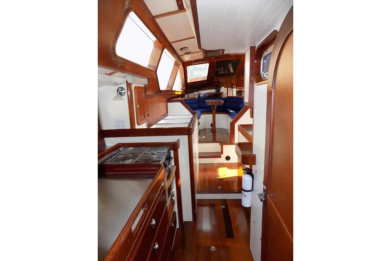 Slide: The Image of Interior of 2014 Custom Aluminum Expedition yacht with wood finishes and compact kitchen. - 33