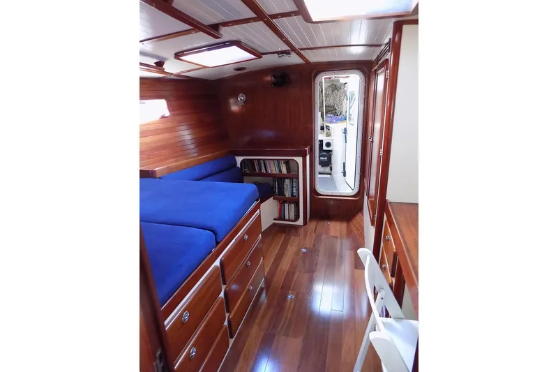 Slide: The Image of Luxurious 2014 Custom Aluminum Expedition yacht interior with wooden finish and blue bedding. - 38