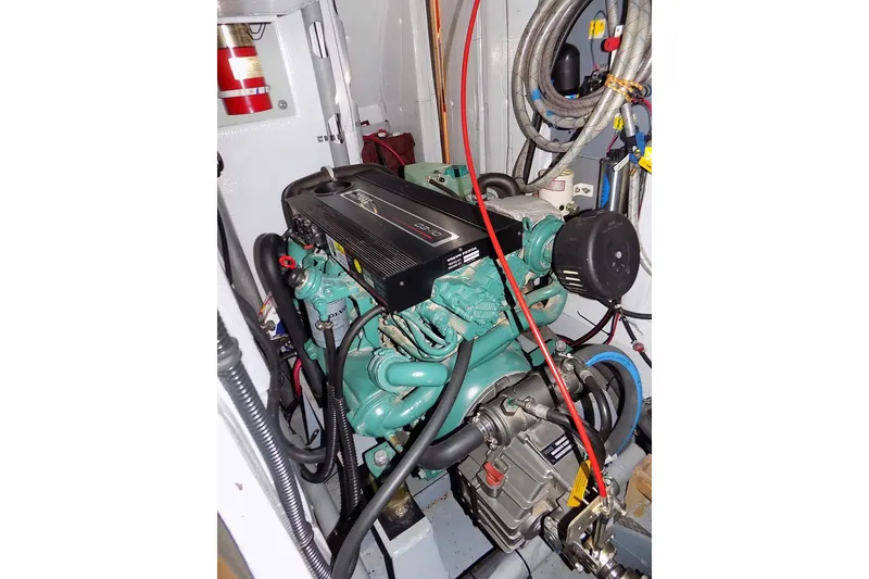 Slide: The Image of Engine room of 2014 Custom Aluminum Expedition boat with visible machinery and wiring. - 44