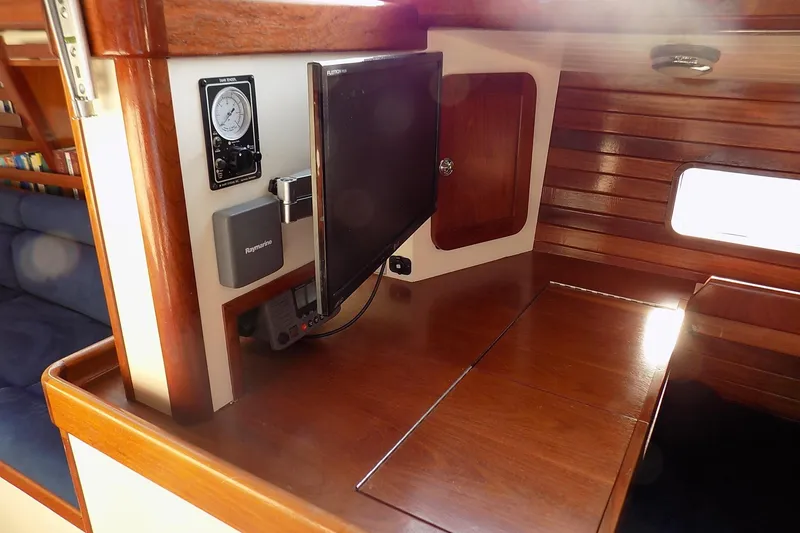 Slide: The Image of Interior of 2014 Custom Aluminum Expedition yacht with navigation equipment and wooden finish. - 60