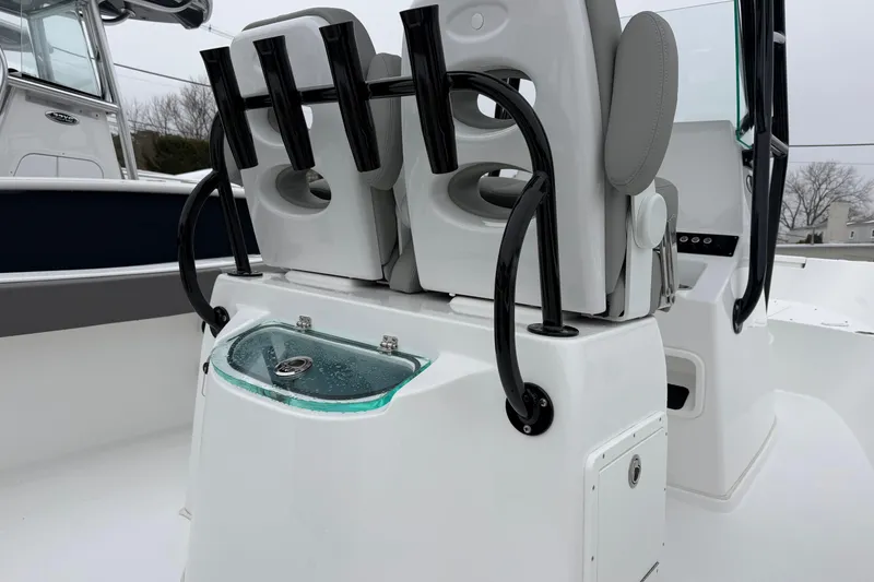 Slide: The Image of 2026 Cape Horn 22 OS boat interior with seating and rod holders. - 14