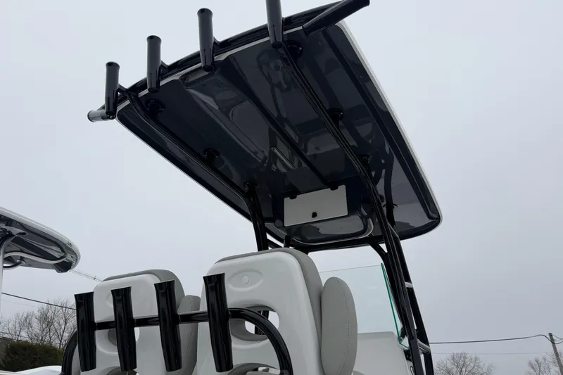 Slide: The Image of 2026 Cape Horn 22 OS boat with T-top and rod holders, viewed from below. - 15